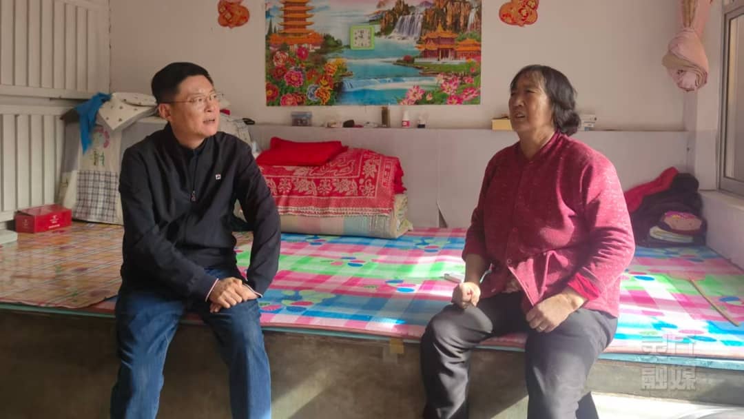 周鹏走访慰问困难群众